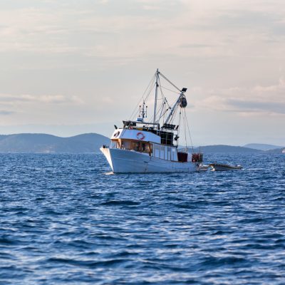 Old fishing boat in the Adriatic sea. Horizontal shot